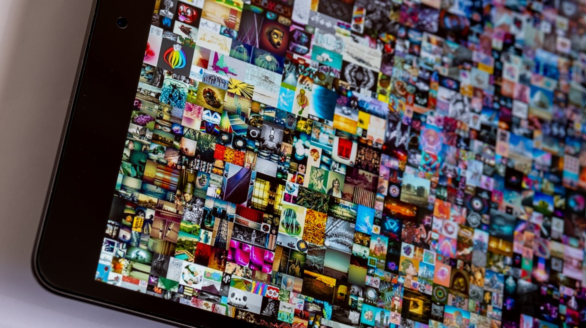 A digital display device featuring Beeple’s artwork that was sold via Christie’s auction house.