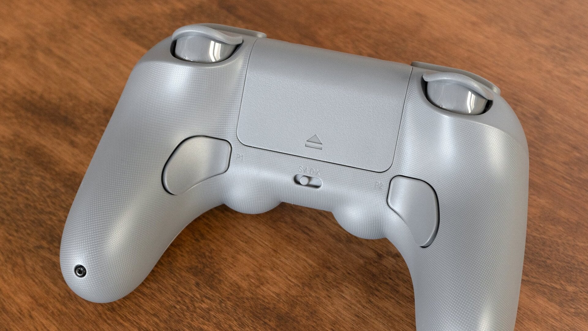 A new four-way toggle switch makes switching compatibility modes much easier on the Pro 2, while a pair of additional trigger buttons on the back let you activate custom macro shortcuts without having to sacrifice other gameplay buttons.