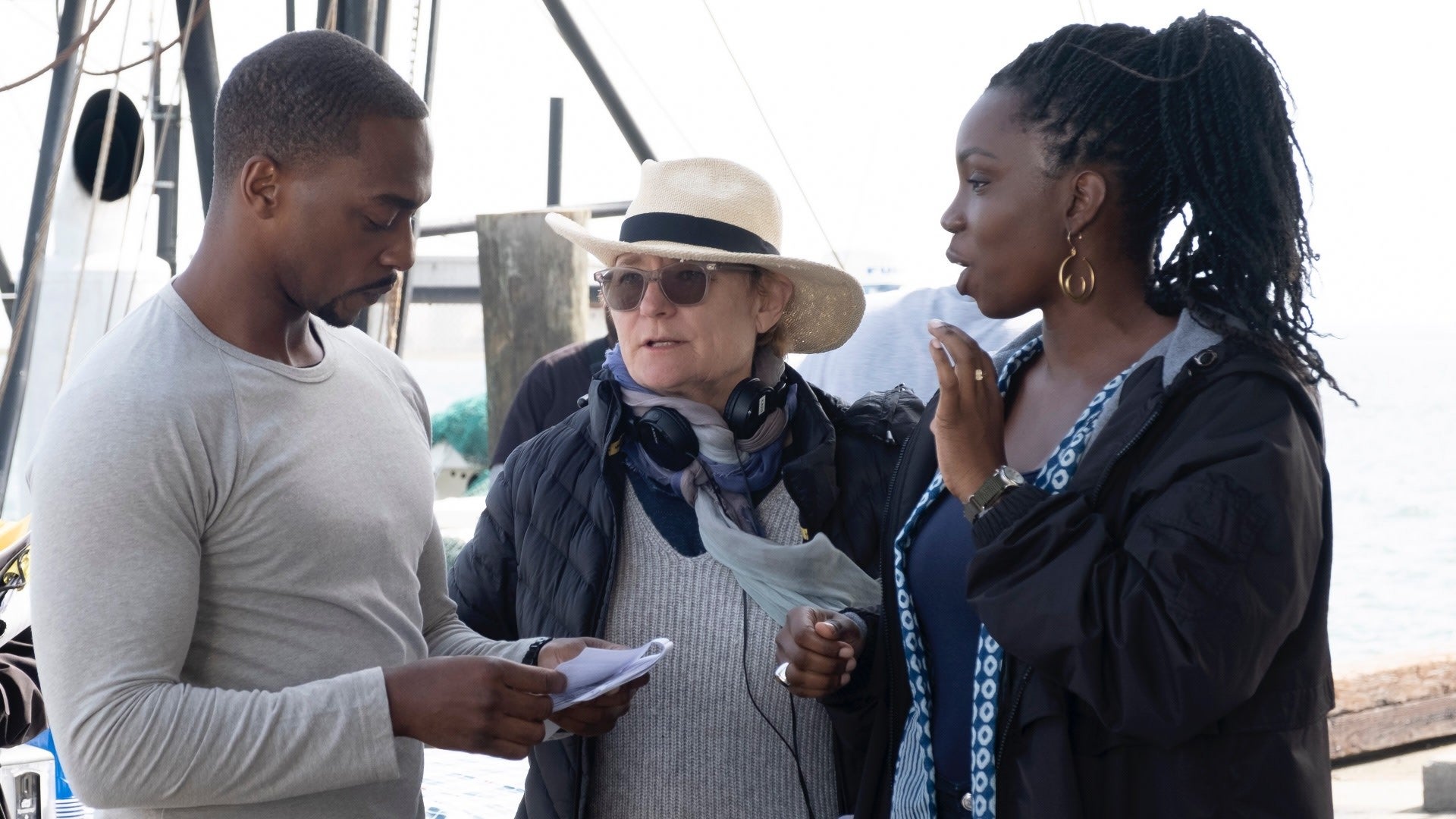 Director Kari Skogland (center) with the Wilson’s Sam (Anthony Mackie) and Sarah (Adepero Oduye) 