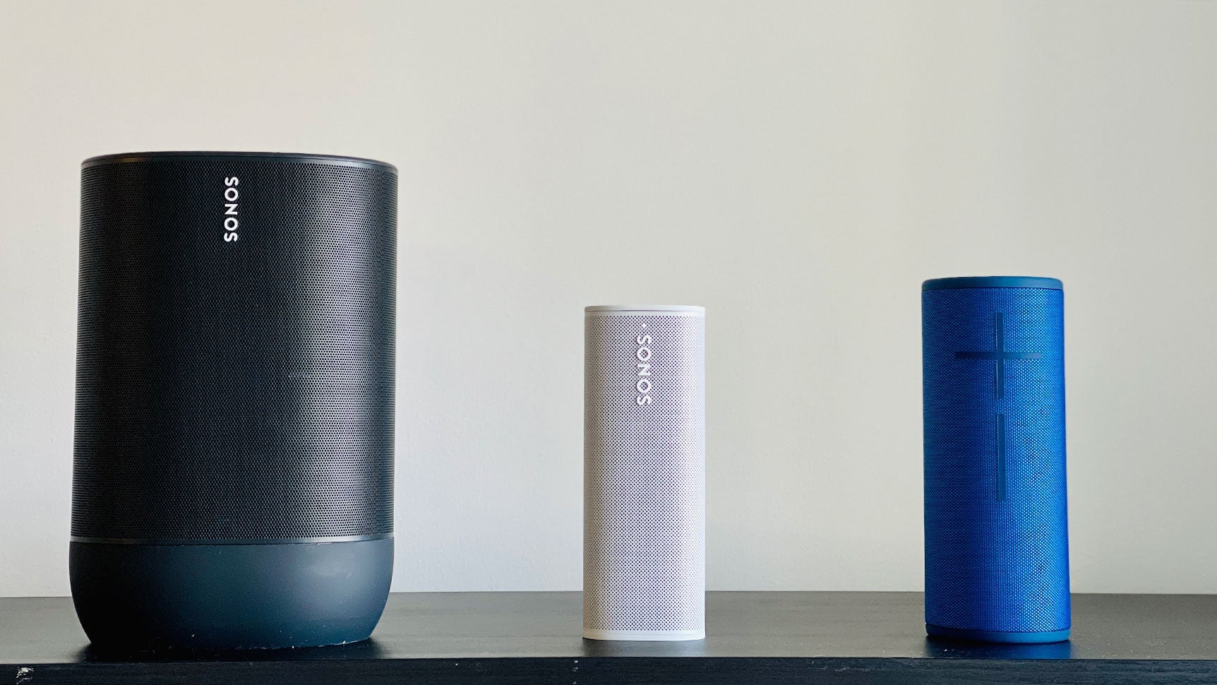 The Sonos Move, the Sonos Roam, and the UE Boom 3. 