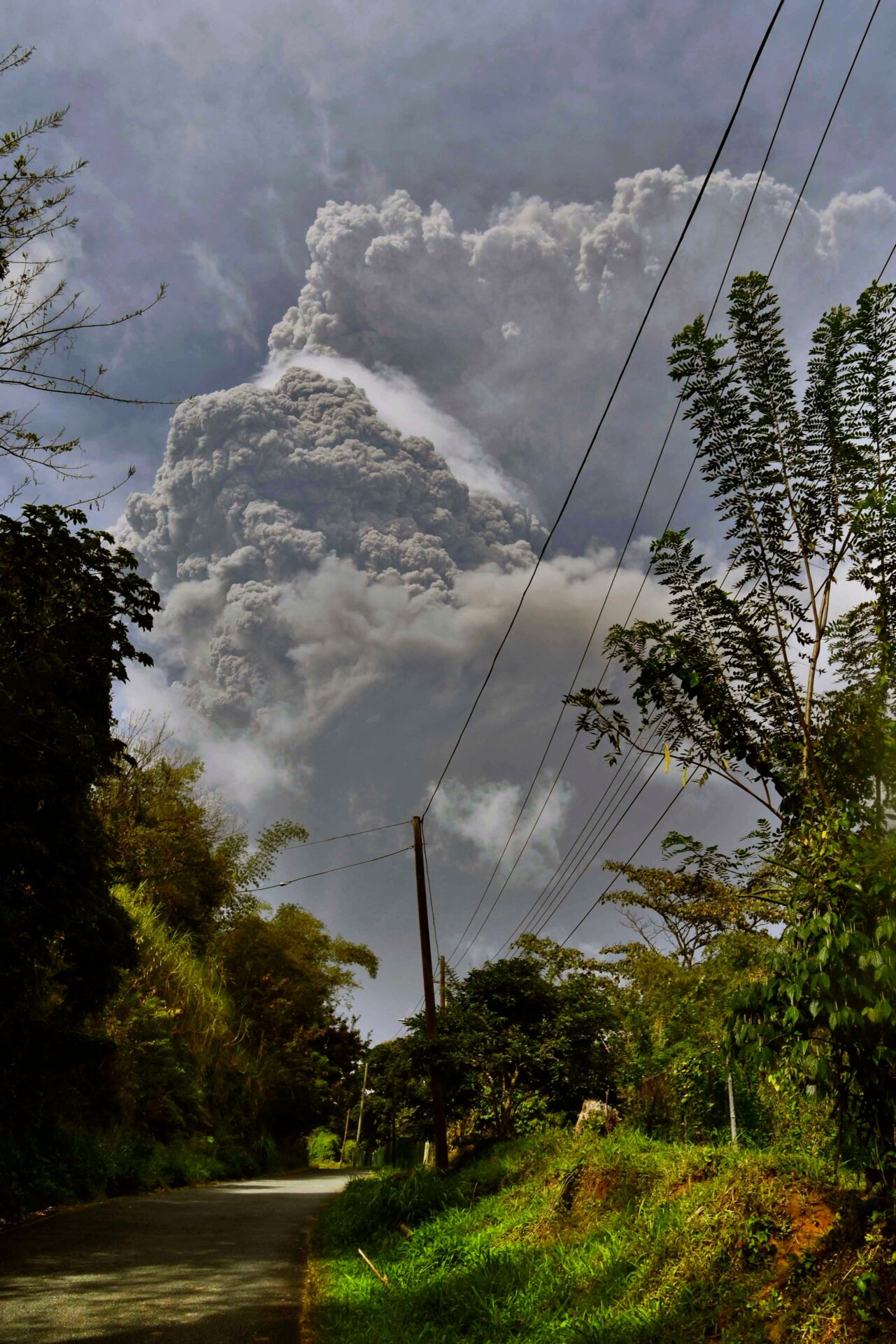 Plumes of ash rise from the La Soufrière volcano as seen from Chateaubelair, Friday, April 9.