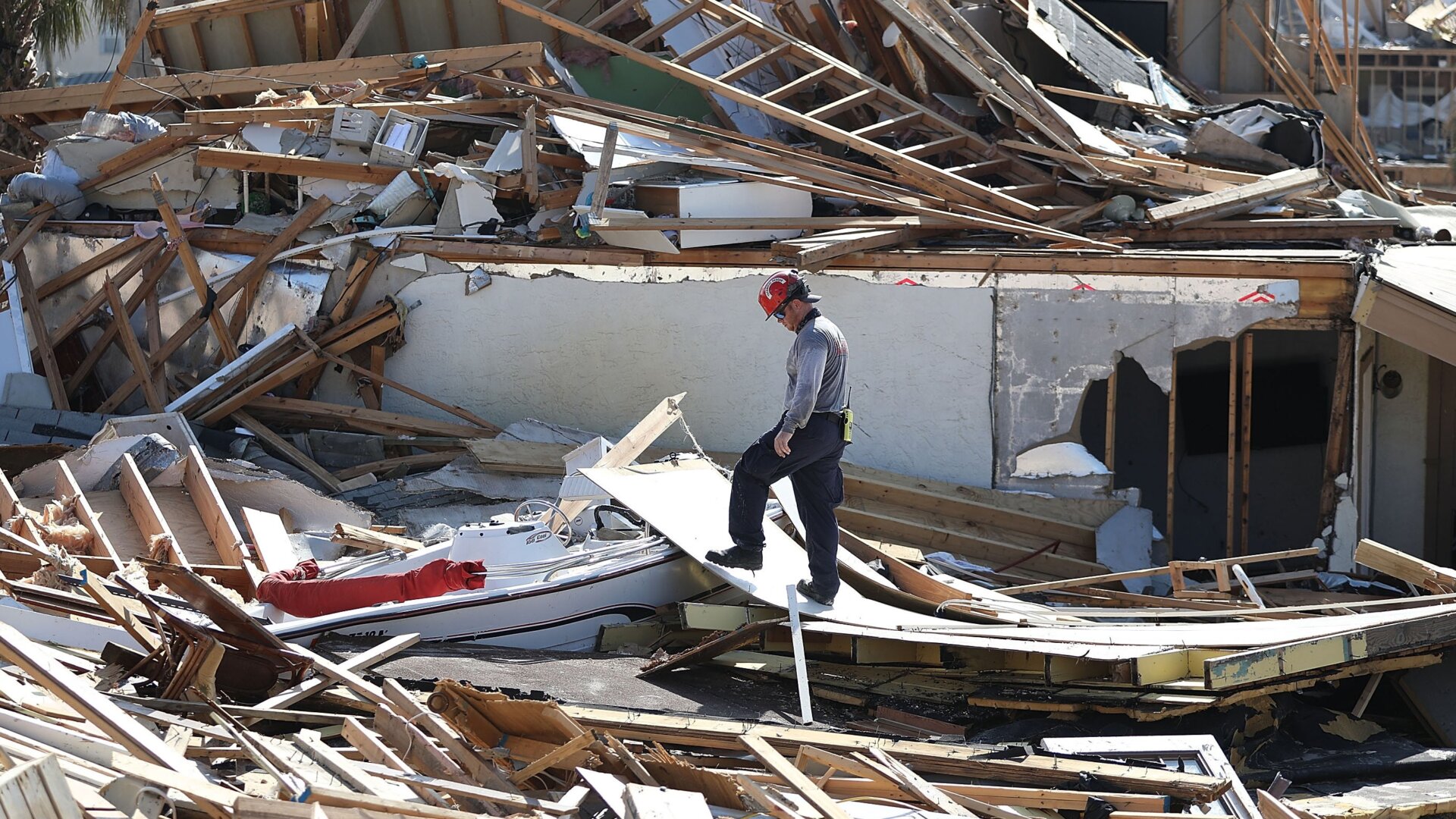 A member of Florida Task Force Two Search and Rescue continue his work of searching the area after Hurricane Michael passed through on Oct. 15, 2018 in Mexico Beach, Florida.