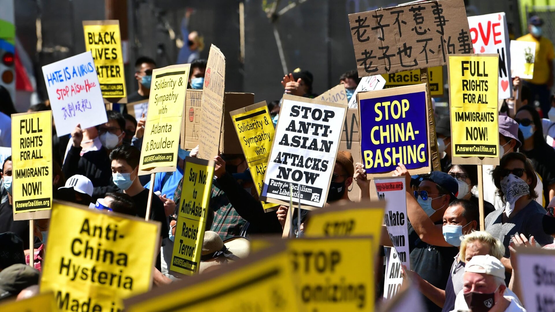 Activists gather for a demonstration at city hall in Los Angeles on March 27, 2021.