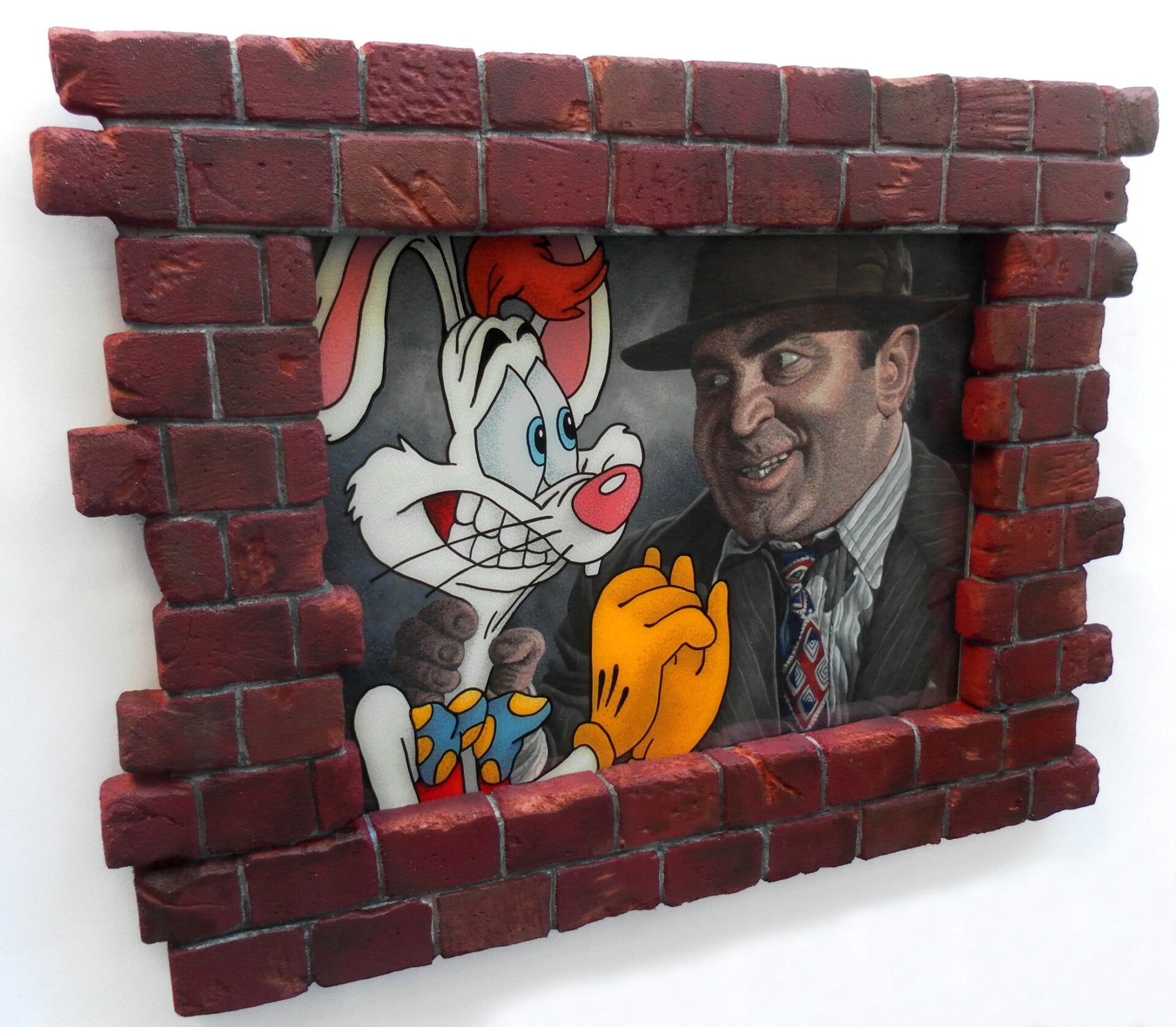 Roger Rabbit and Bob Hoskins in Who Framed Roger Rabbit? (The answer in this case? JoKa.)