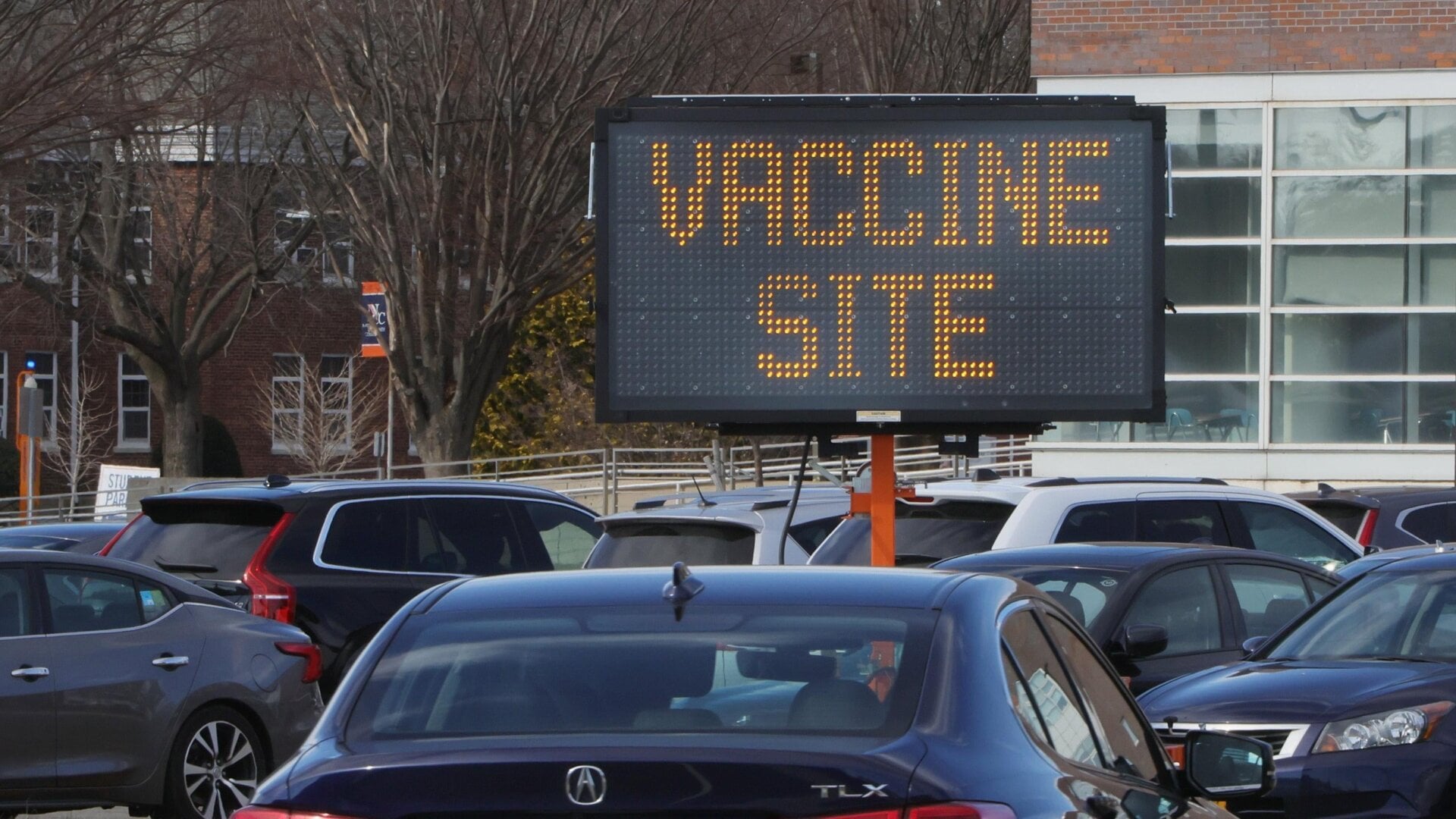 A sign greeting people who arrive to line up for covid-19 vaccines at Nassau Community College on January 10, 2021 in Garden City, New York.