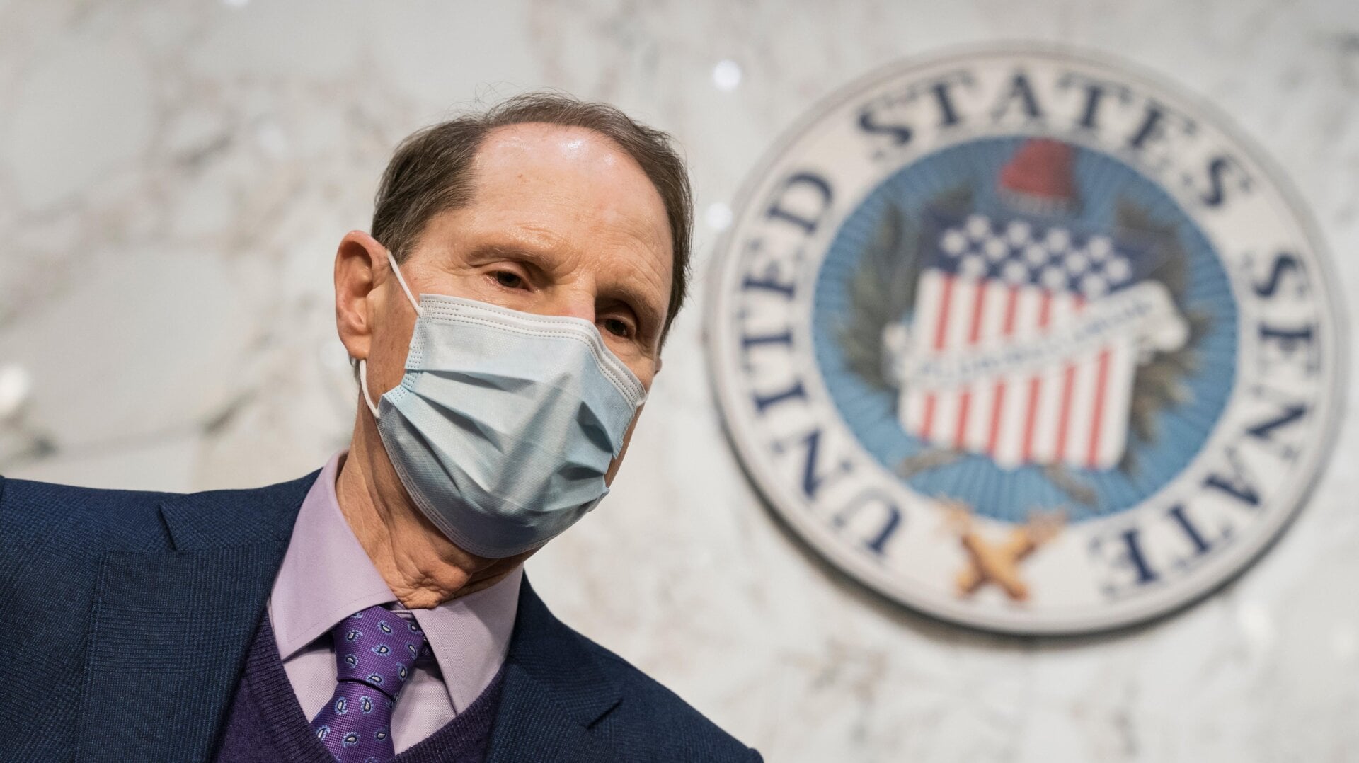 Sen. Ron Wyden, D-Ore., chair of the Senate Finance Committee, prepares the panel for a vote on Xavier Becerra, President Joe Biden’s Health and Human Services Dept. nominee, at the Capitol in Washington, Wednesday, March 3, 2021.