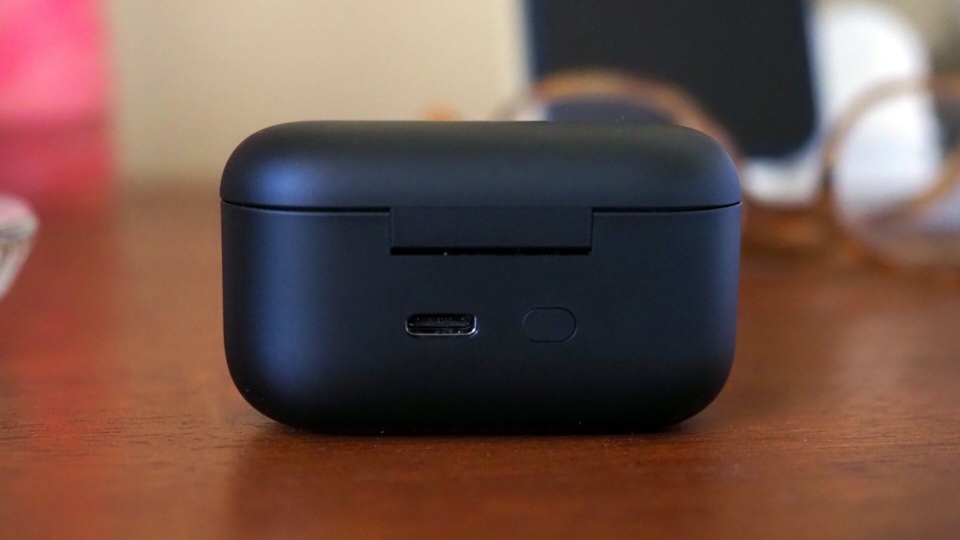 USB-C port (left) and Bluetooth pairing button (right). Quick and easy.