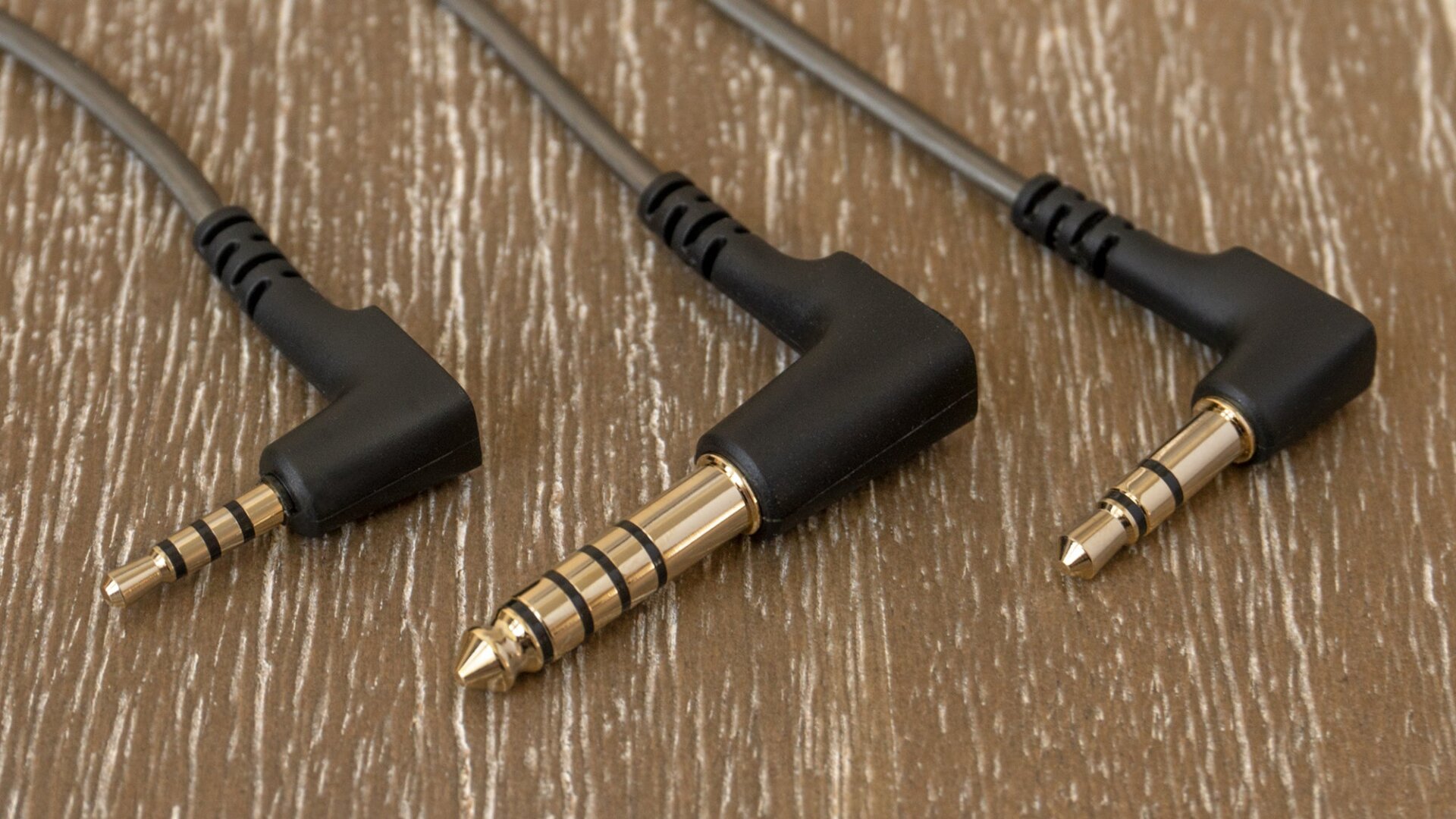Sennheiser includes three cables with the IE 900s, one with a standard unbalanced 3.5mm connector, and two larger options that provide a balanced connection for eliminating unwanted audio hum.