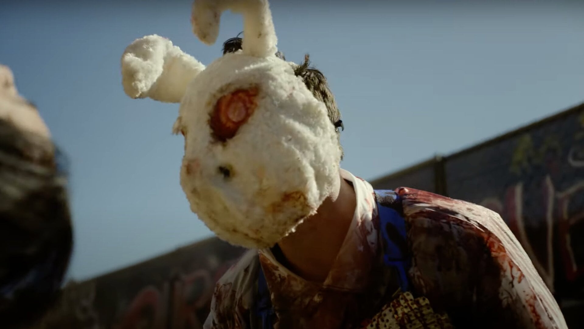 Where, exactly, is this man seeing out of this mask? The top eyehole is just a scarred forehead while the nostrils are much too low.