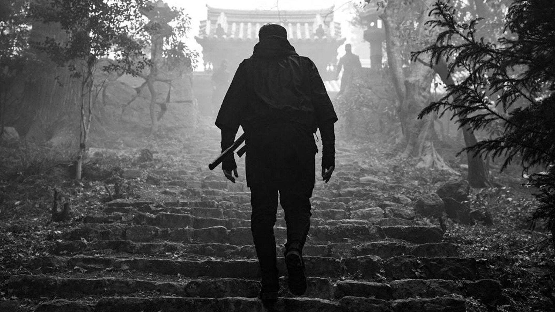 Henry Golding as Snake Eyes, or at least as the Snake-Eyes-to-be.