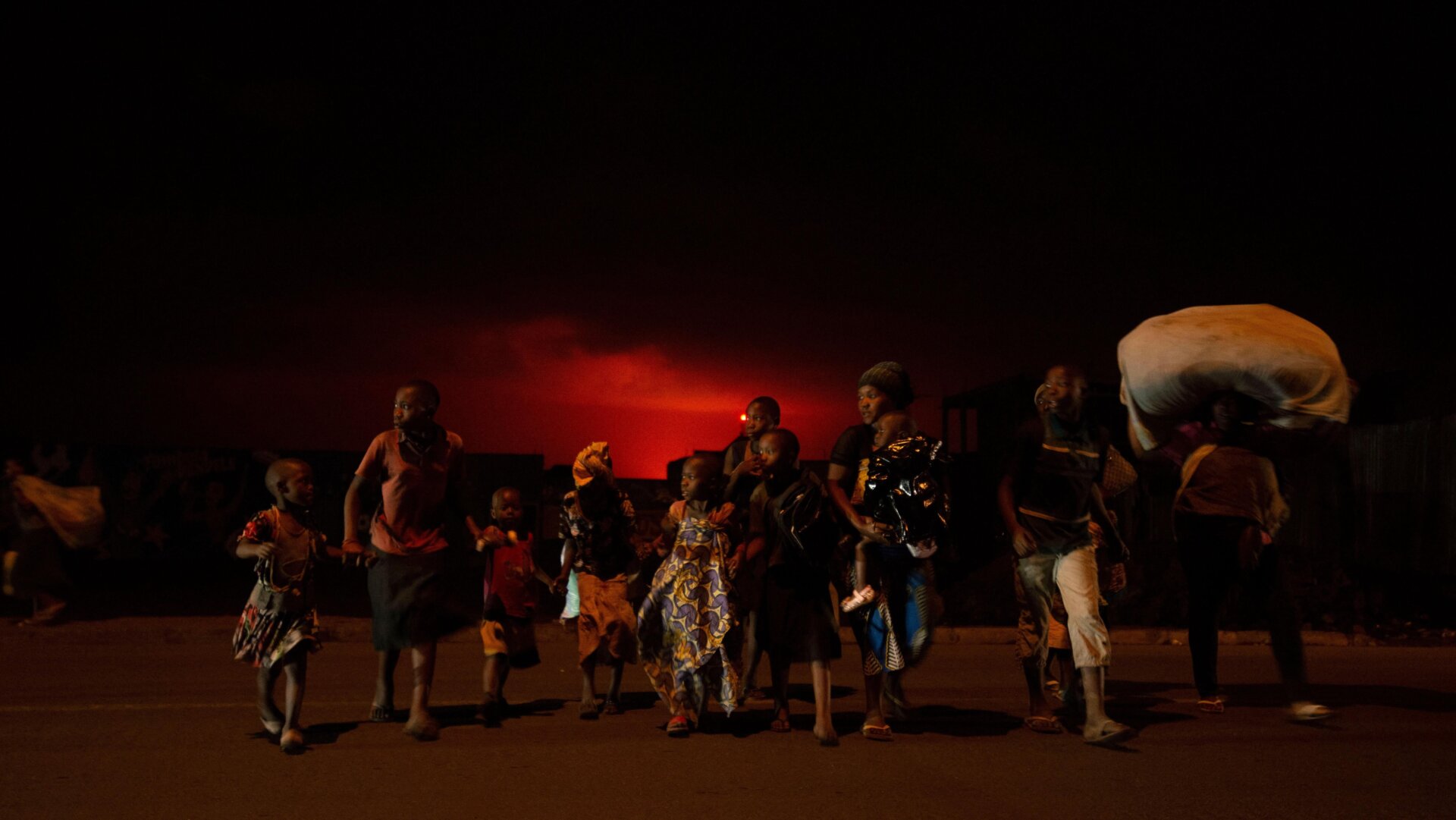 Goma residents are seen leaving the city following a sudden activity of Nyiragongo.