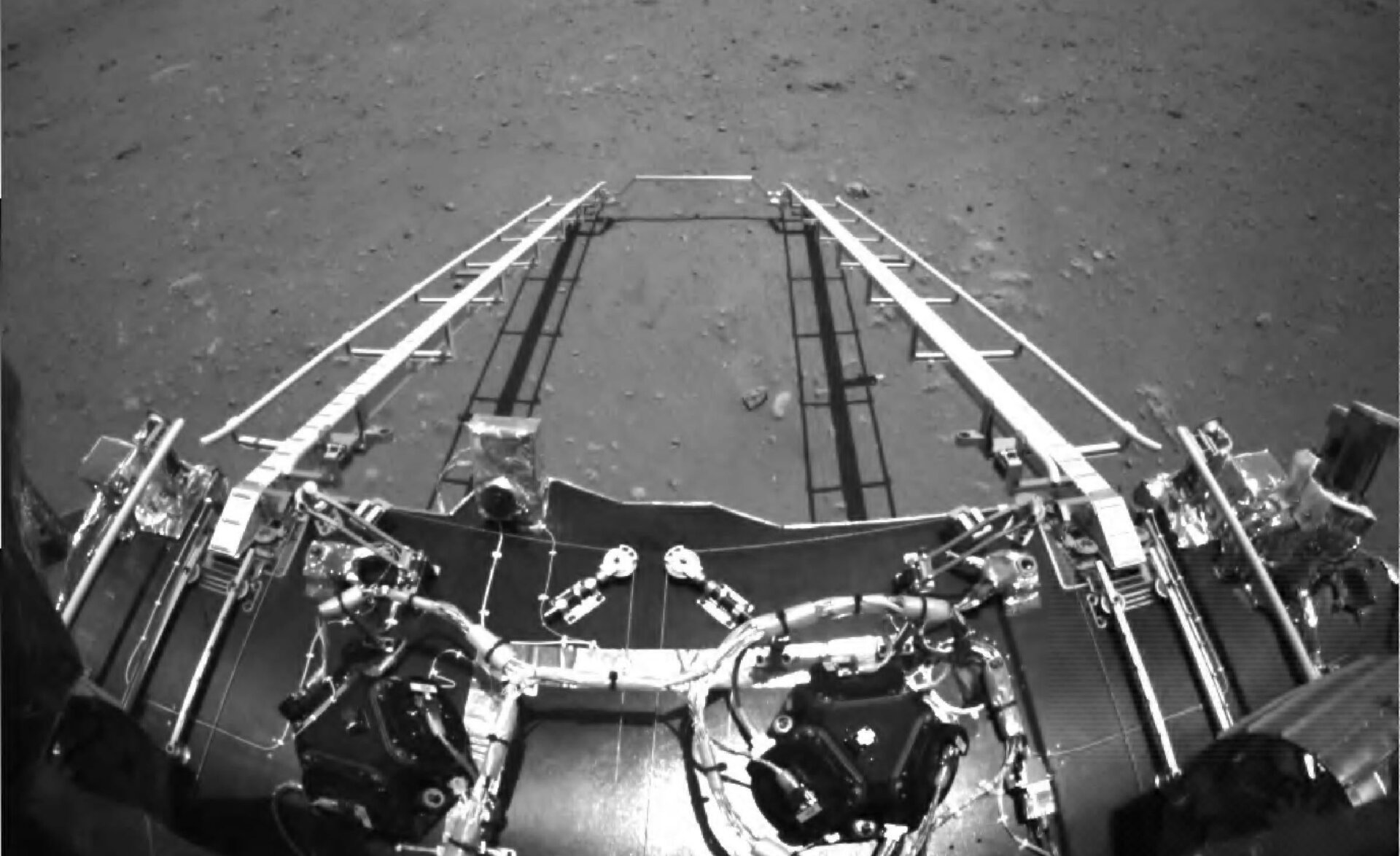 One image shows the disembarkation ramp the rover will use to reach the Martian surface from the lander.
