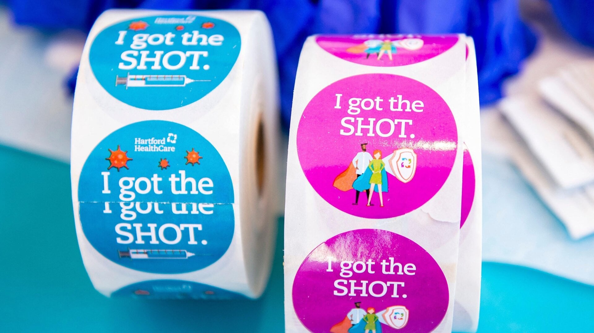 Stickers for the clergy to wear after they receive the vaccine sit on a table at Hartford HealthCare St. Vincents Medical Center in Bridgeport, Connecticut on February 26, 2021.