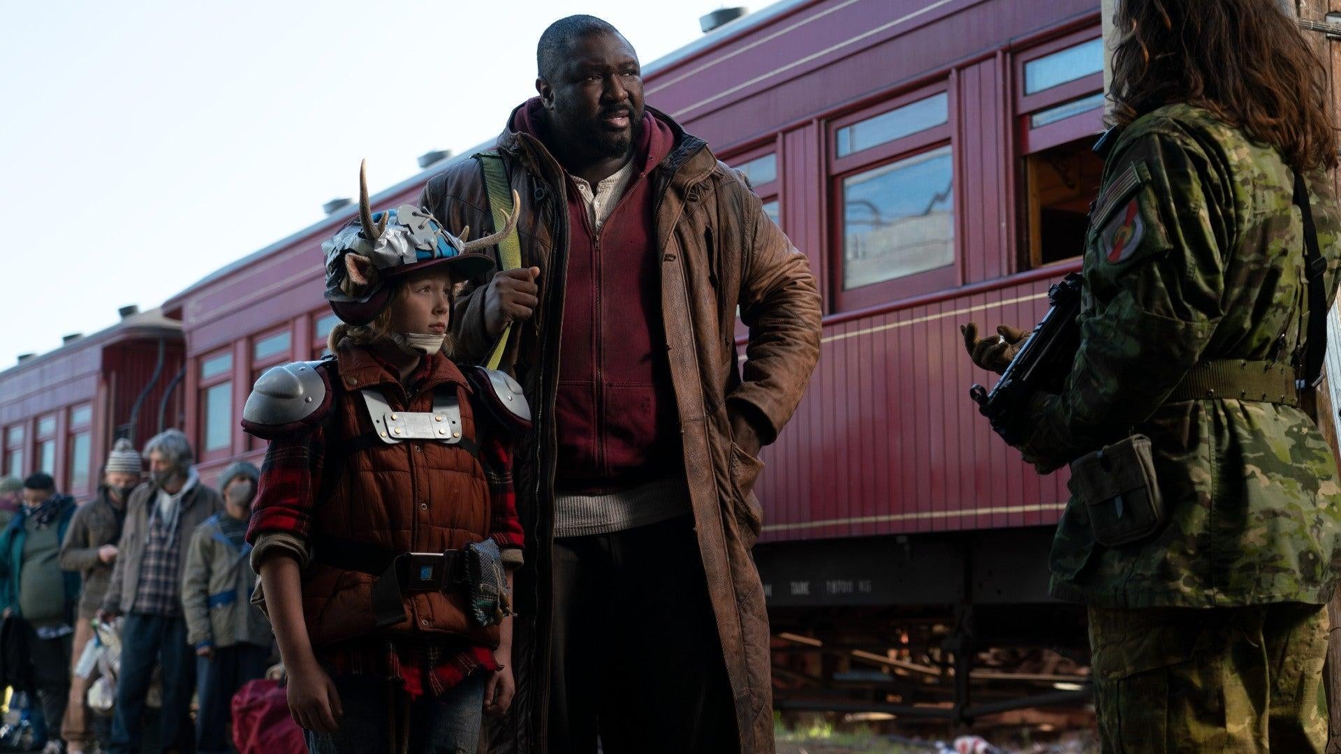 Gus (Christian Convery) and Tommy (Nonso Anozie) in Sweet Tooth.