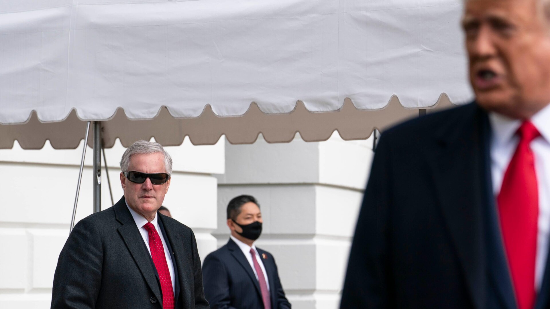 Former White House Chief of Staff Mark Meadows, left, seen outside the White House in DC in October 2020.