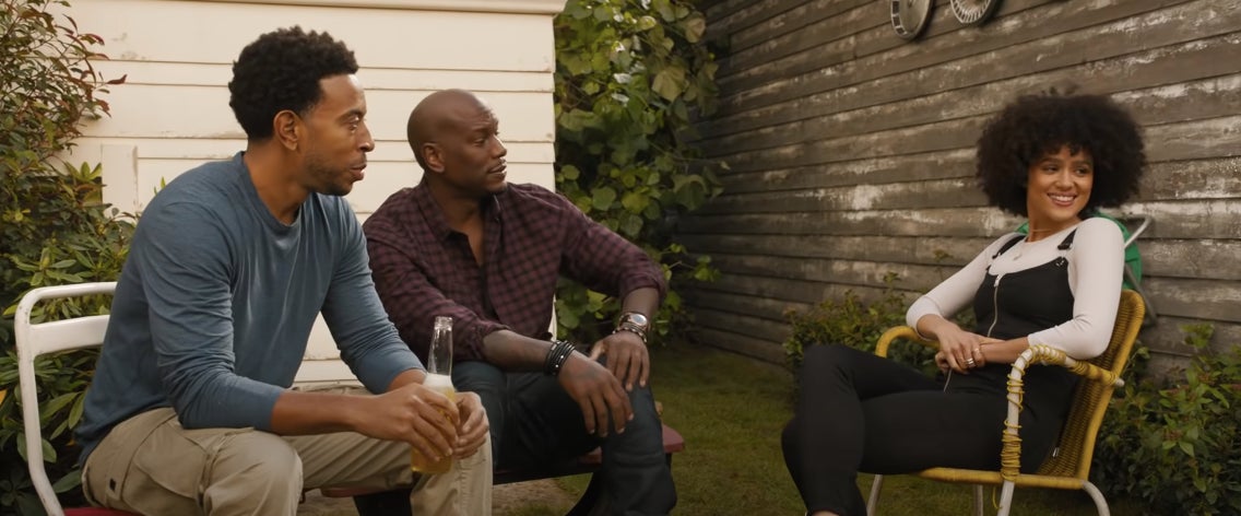 Edwin and Roman, two friends, hanging out at a function with Ramsey, a newcomer to the Fast Family.