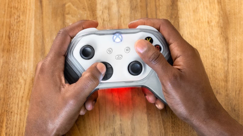 A bright LED on each battery makes a gamer’s hands glow red when the battery is nearing depletion.