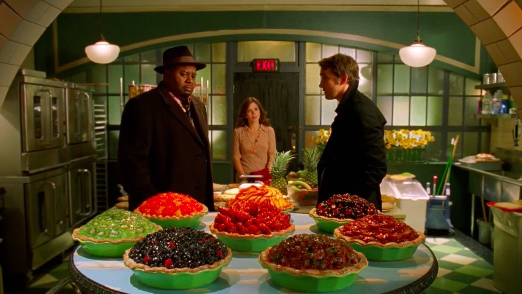 Emerson remarking on the number of pies Ned’s baked.