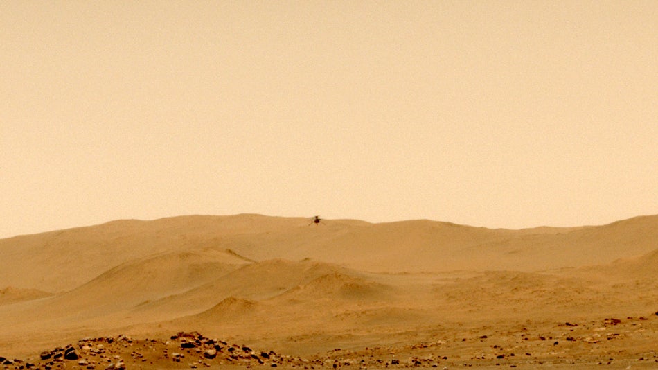 Ingenuity in flight during its fifth trip into the Martian air.