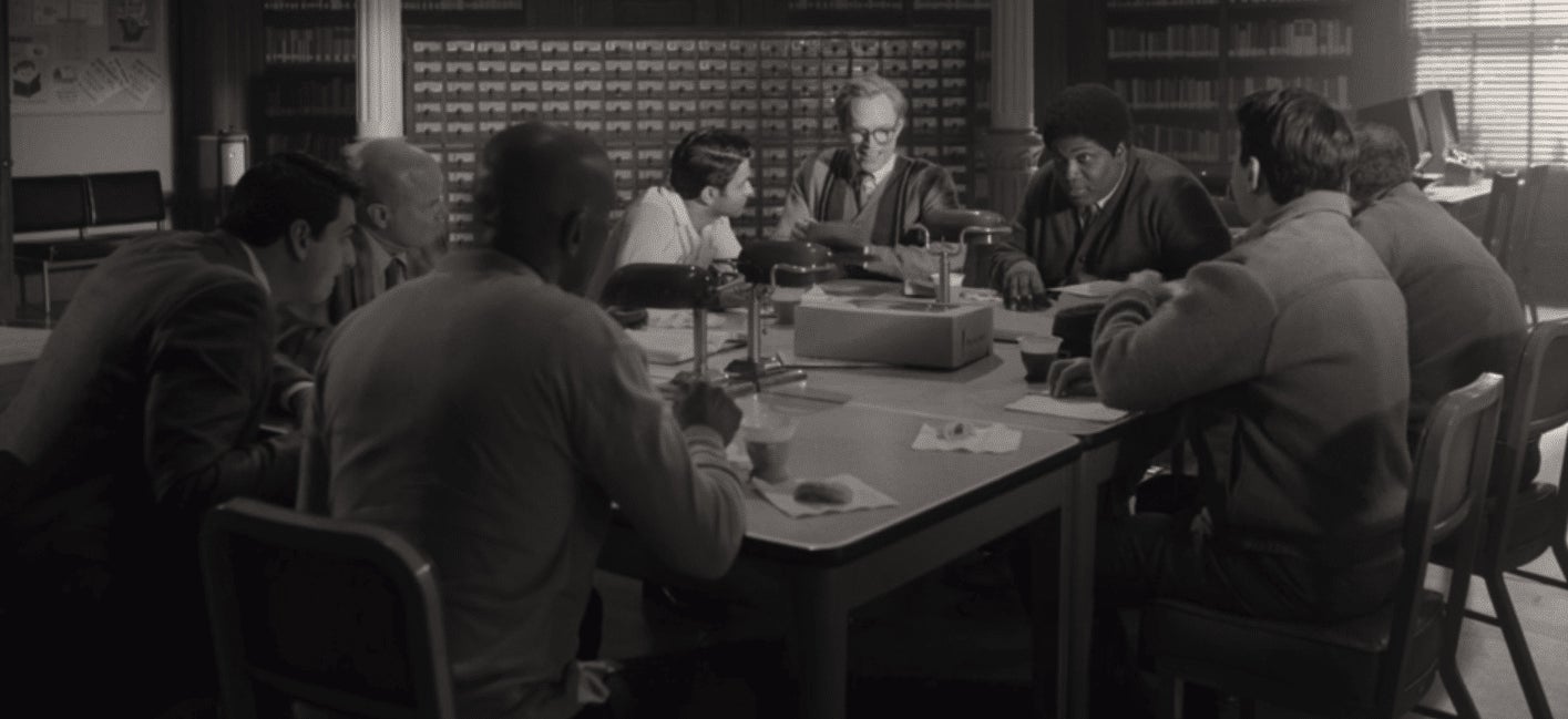 Vision and the men of Westview having a platonic neighborhood watch meeting.