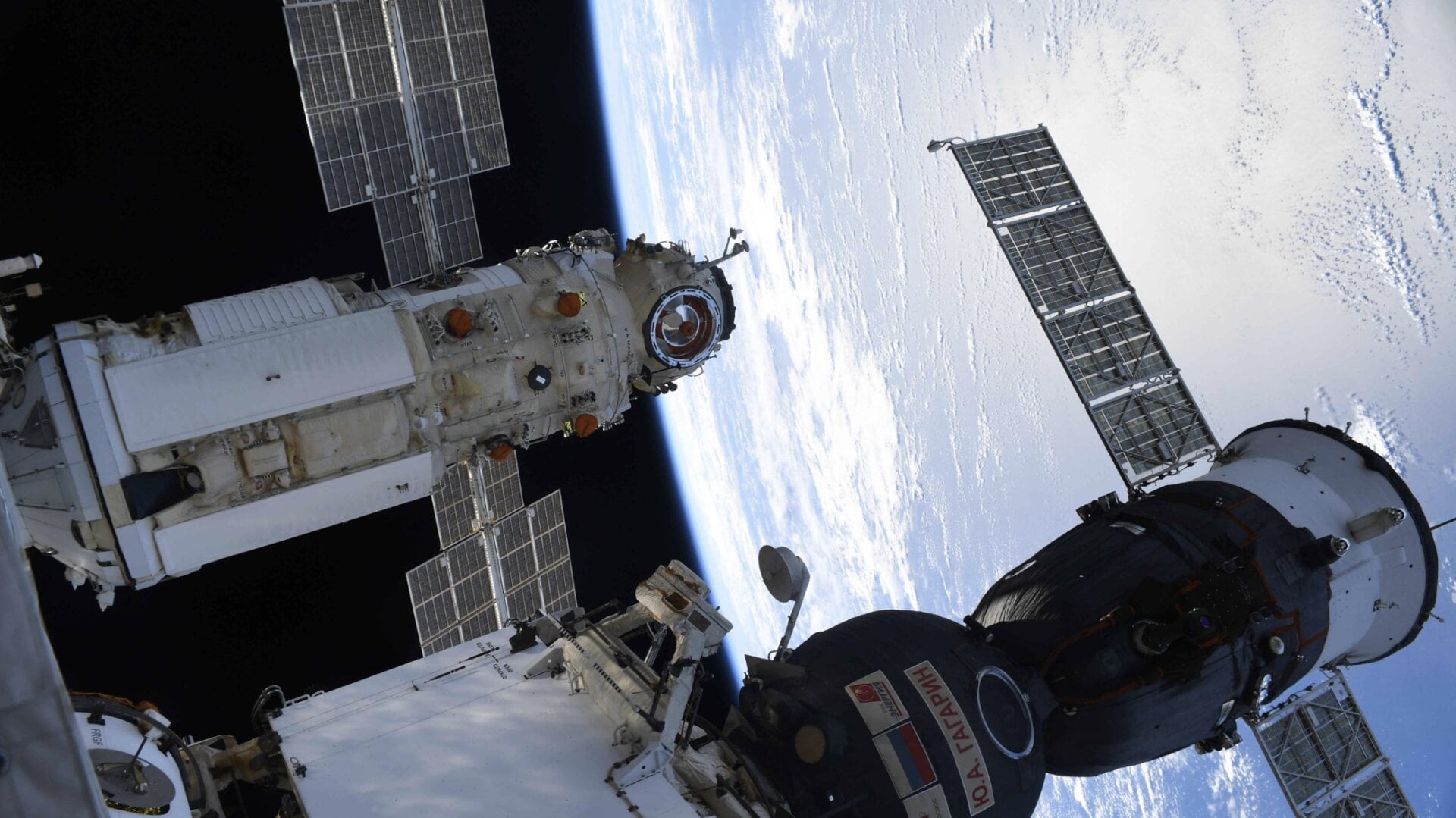 The Nauka module (left) docked to the ISS, with a Soyuz spacecraft (right) parked nearby.