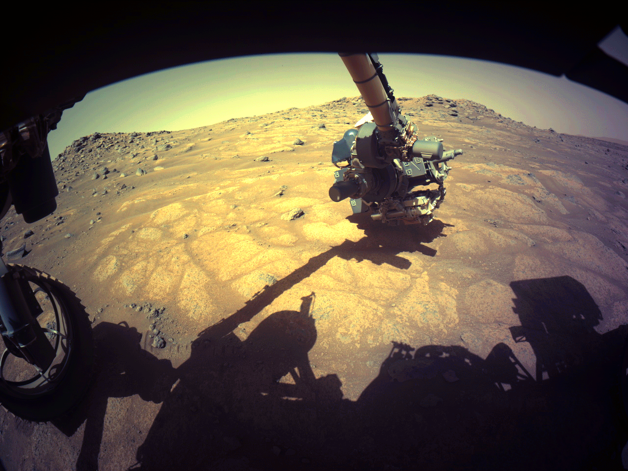 Perseverance’s robotic arm examining rocks in Jezero’s Crater Floor Fractured Rock unit on July 10, 2021.