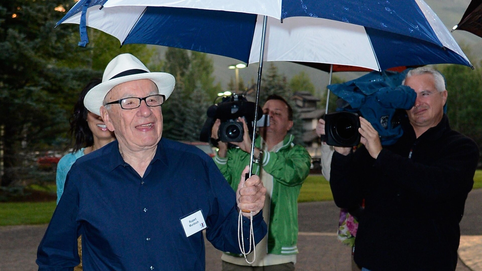 News Corp’s Rupert Murdoch experiencing some weather.