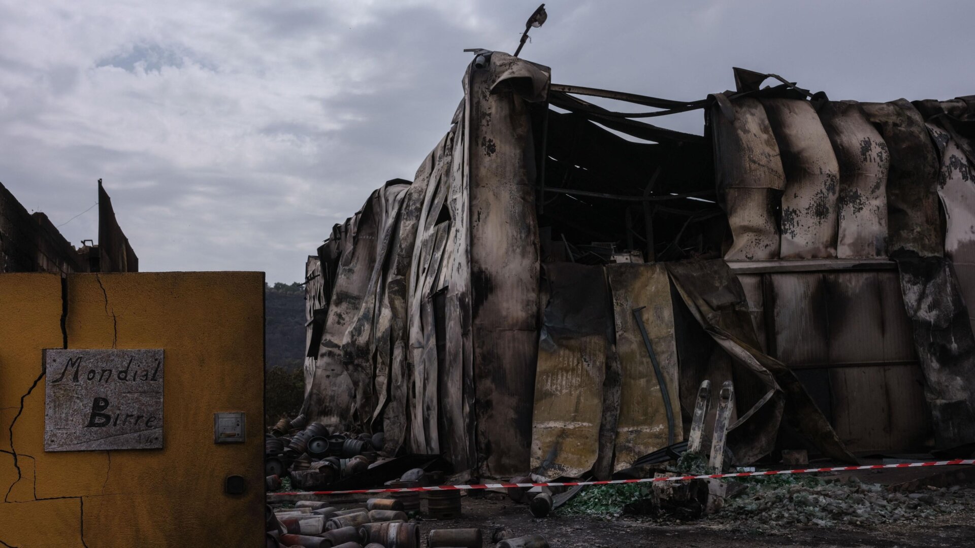 This picture shows a small brewery destroyed by the fire near the town of Cuglieri on the Italian island of Sardinia on July 26, 2021.