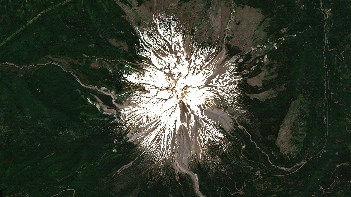 A satellite composite showing Mount Hood on June 26, 2021 and July 11, 2021. 