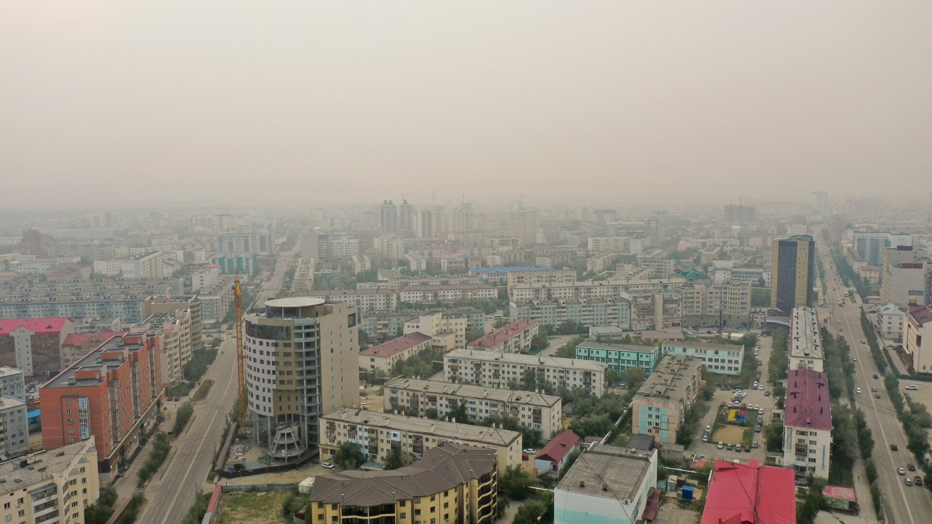 Smoke form a forest fire covers Yakustk, the capital of the Republic of Sakha on July 19, 2021. 