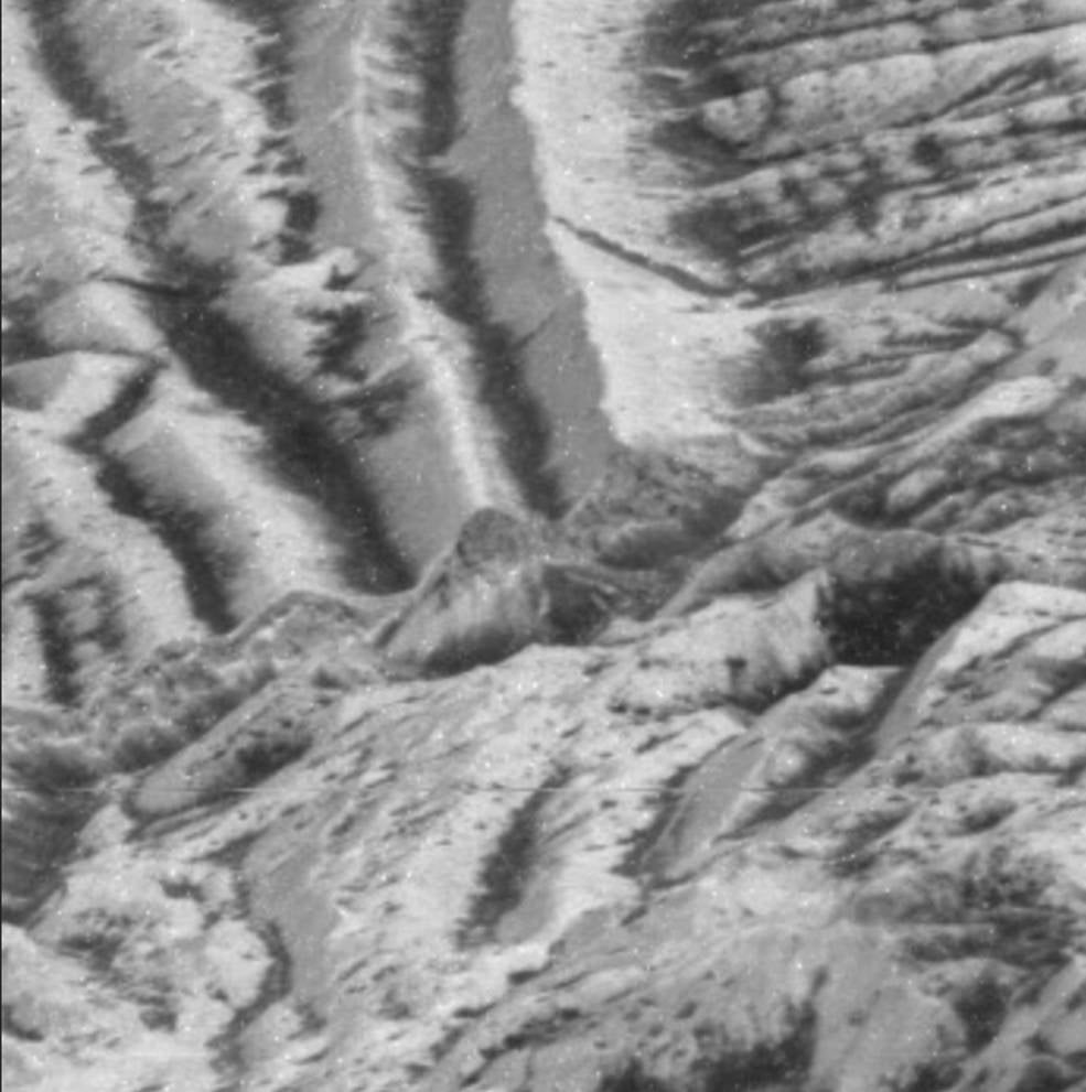 Close-up view of Europa’s surface, as captured by NASA’s now-ended Galileo mission. The area in the center shows the effects of impact gardening. 