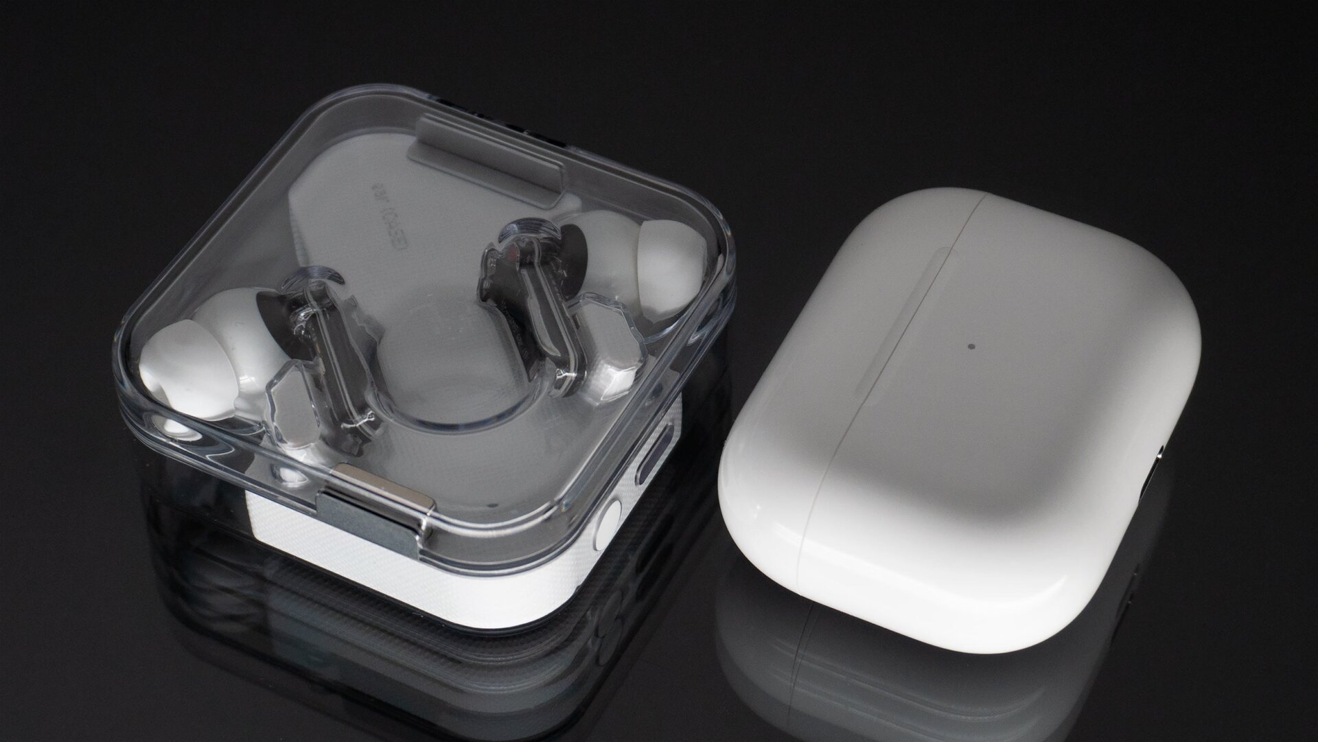 The ear (1) charging case is a bit on the bulky side, but it gives the earbuds up to 34 hours of playback time when away from a power source, compared to 24 hours in total with the AirPods Pro’s charging case.