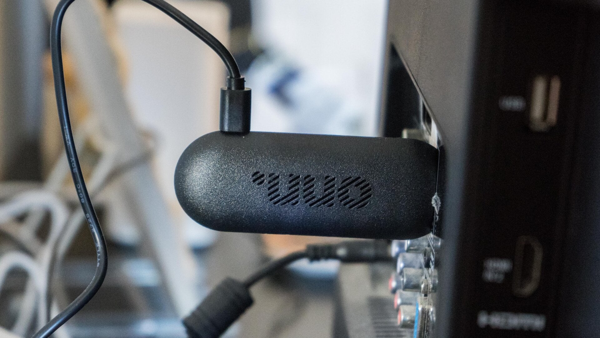 The Onn FHD Streaming Stick blends in with the rest of the mess of wires behind your TV.
