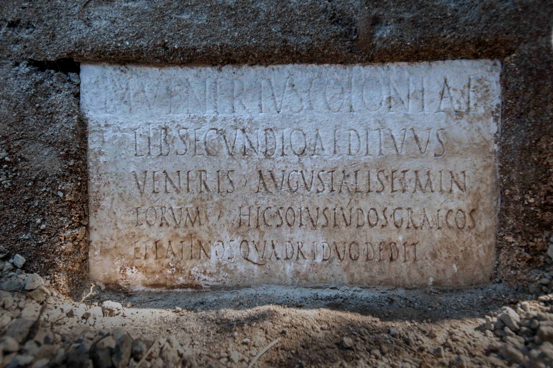 The inscription, written on a marble slab, found at the tomb. 