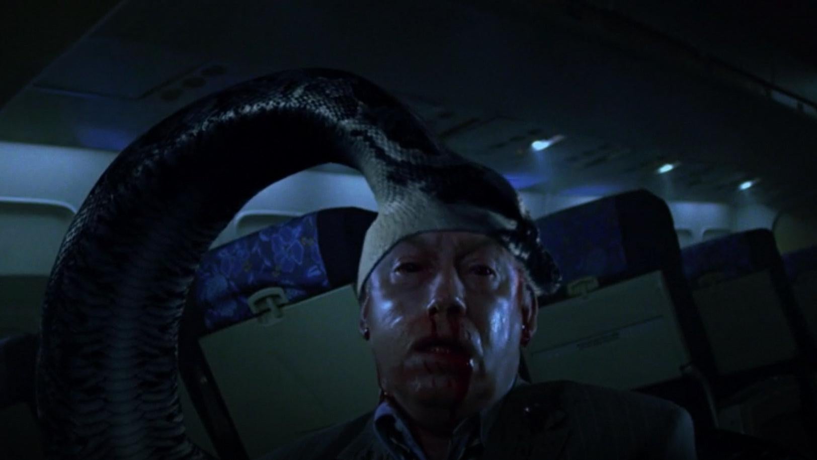 I had to screenshot this moment from the movie where a huge snake eats a man alive.