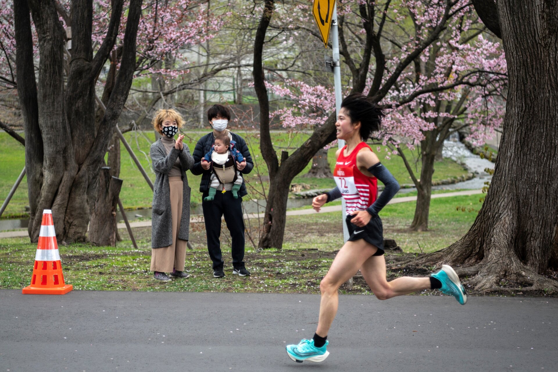 An athlete competes in the half-marathon race which doubles as a test event for the 2020 Tokyo Olympics, in Sapporo on May 5, 2021. 