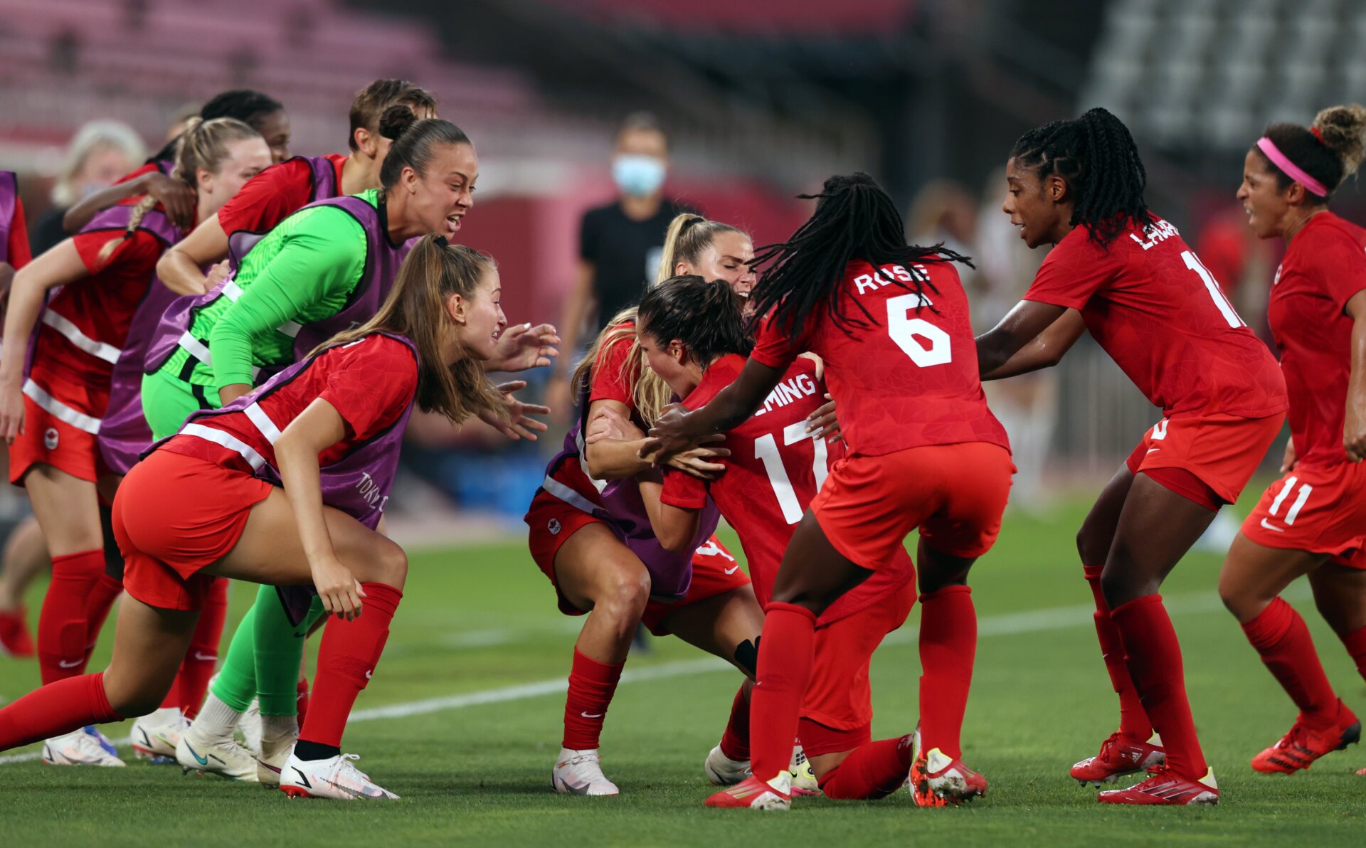 Players of Team Canada celebrate their side’s first goal scored by Jessie Fleming of Team Canada during the semifinal match between the U.S. and Canada at Kashima Stadium on Aug. 2, 2021 in Kashima, Ibaraki, Japan. 