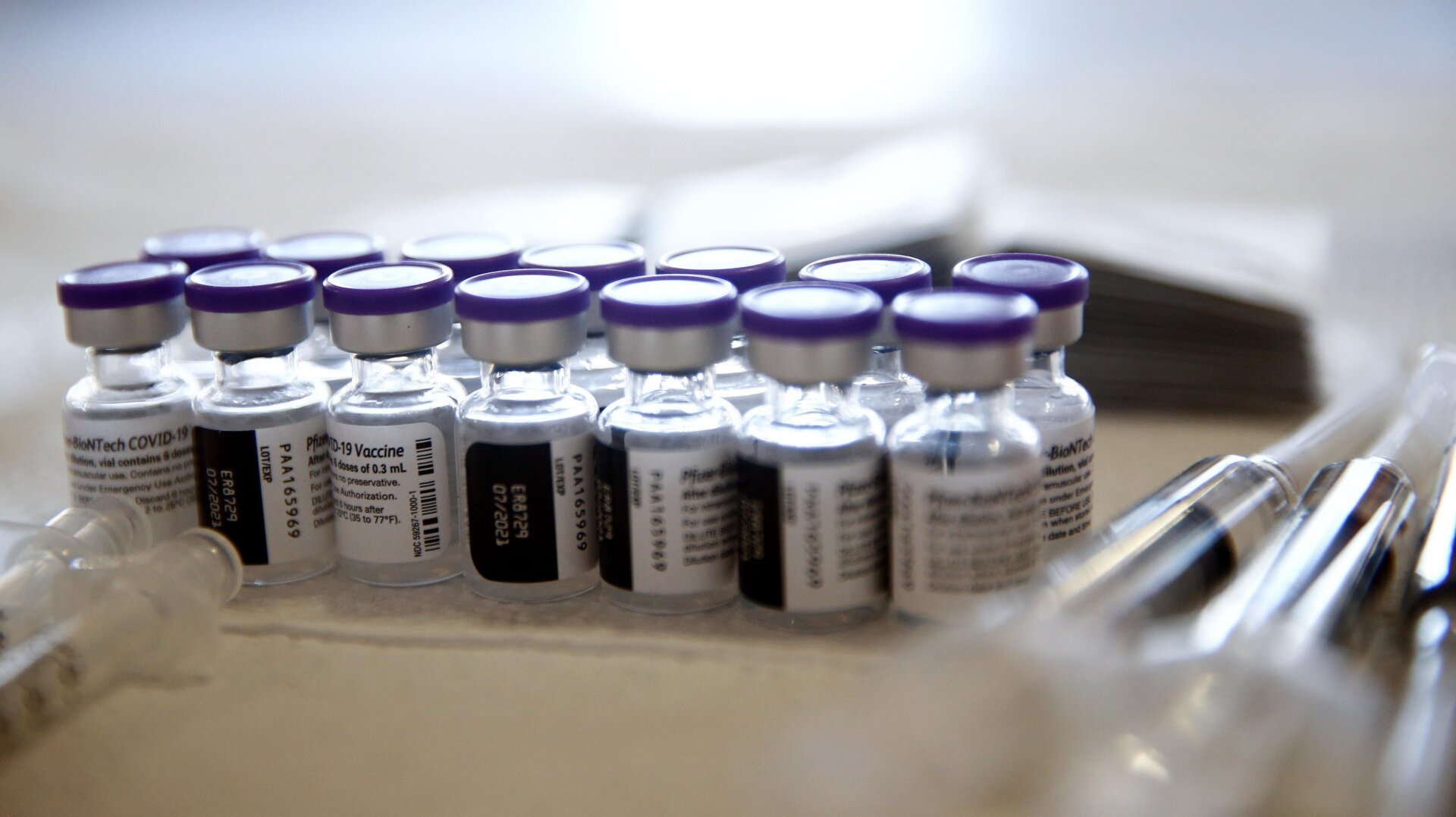 Vials containing doses of the Pfizer COVID-19 vaccine are viewed at a clinic targeting minority community members at St. Patrick’s Catholic Church on April 9, 2021 in Los Angeles, California.