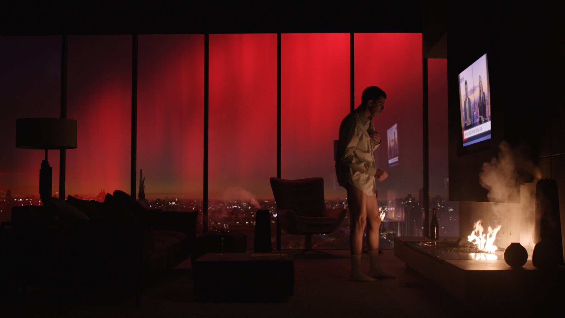 TV news, blood-red sky, roaring fire, no pants. A bit worrisome, all taken together.