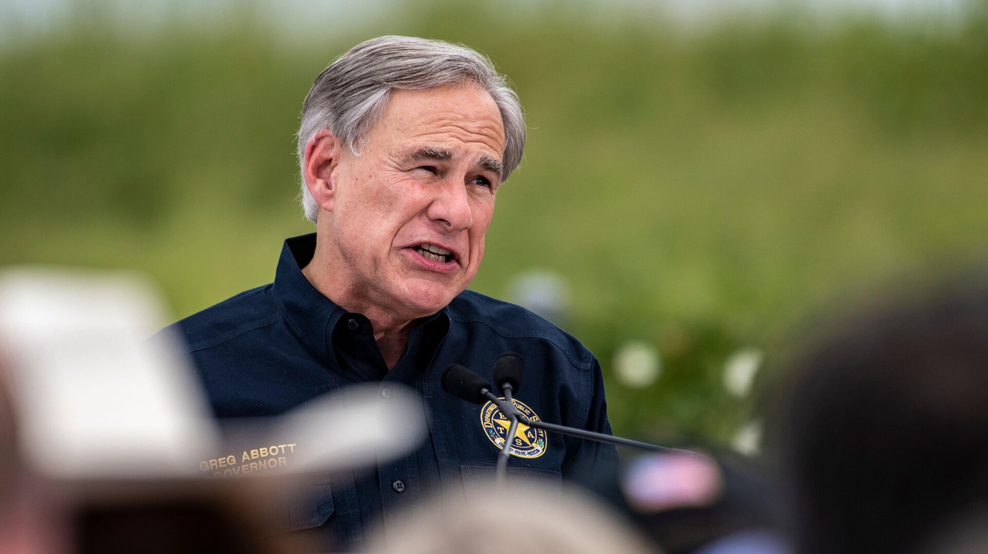 Texas Governor Greg Abbott speaks during a visit to the border wall near Pharr, Texas on June 30, 2021.