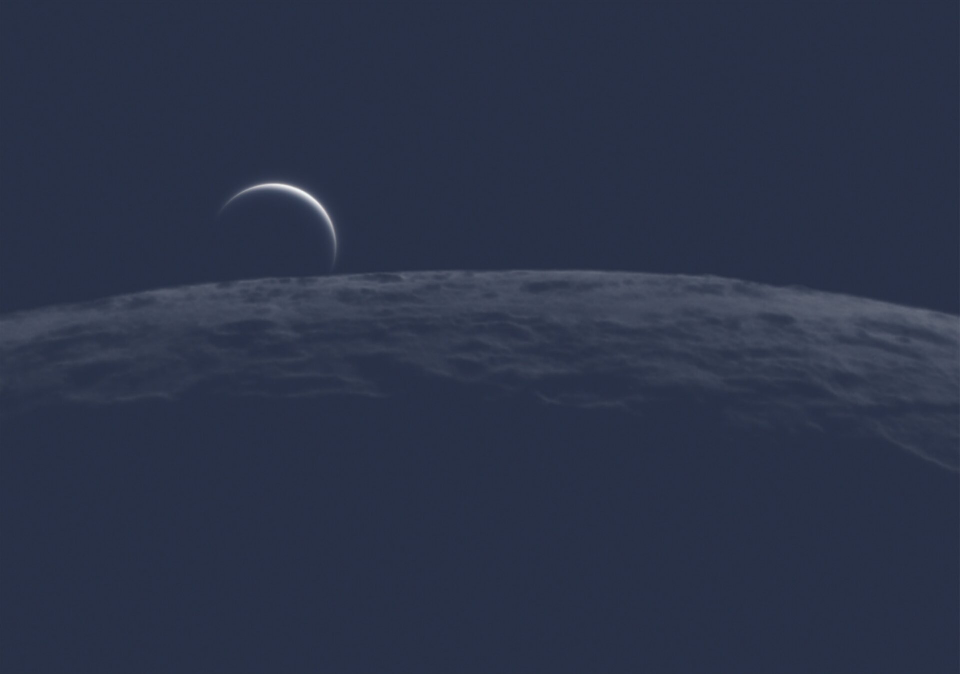 A surreal look at Venus over the Moon’s horizon.