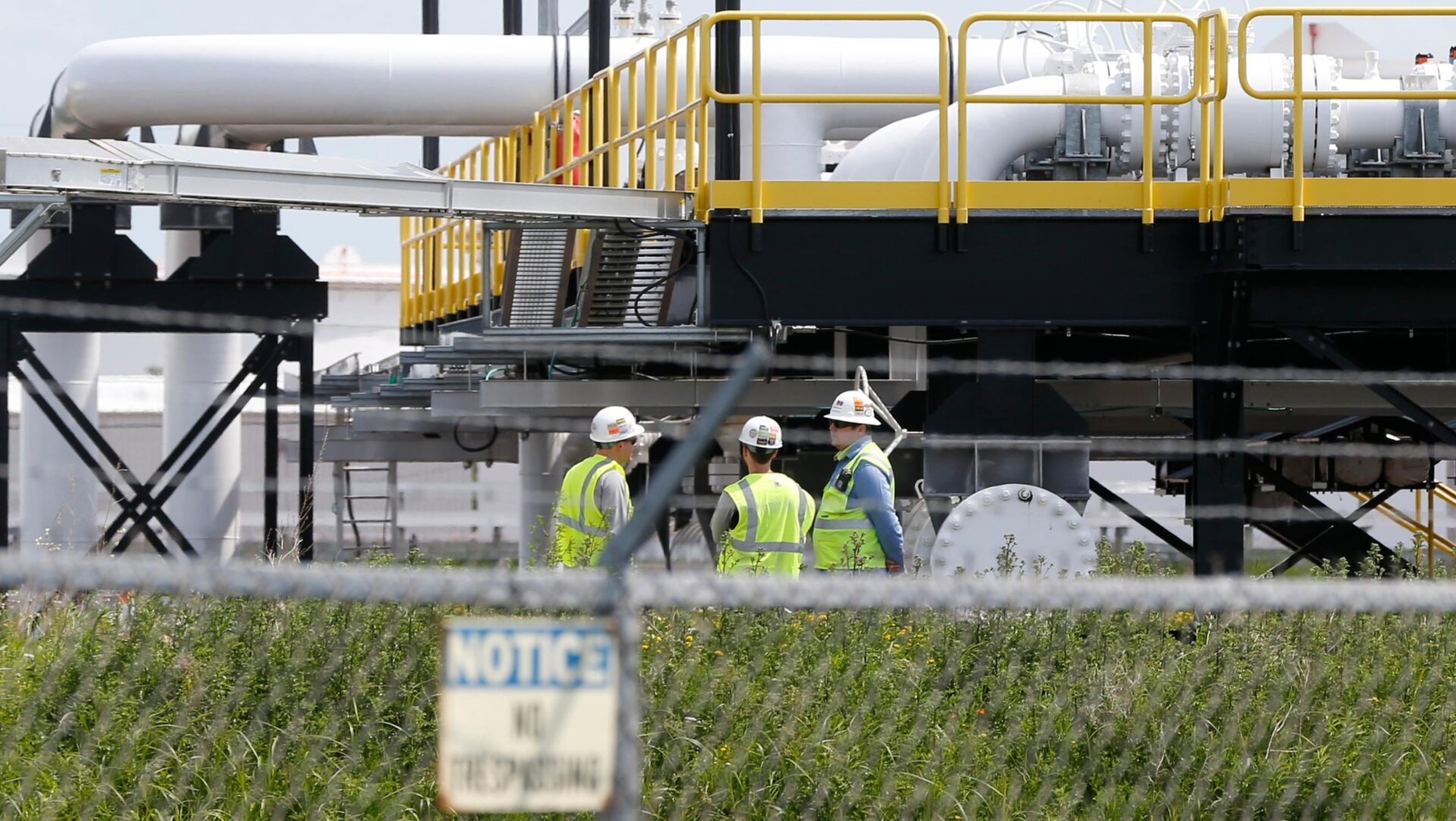 Workers at Enbridge Energy’s terminal in Superior, Wisconsin, as seen in June 2018.