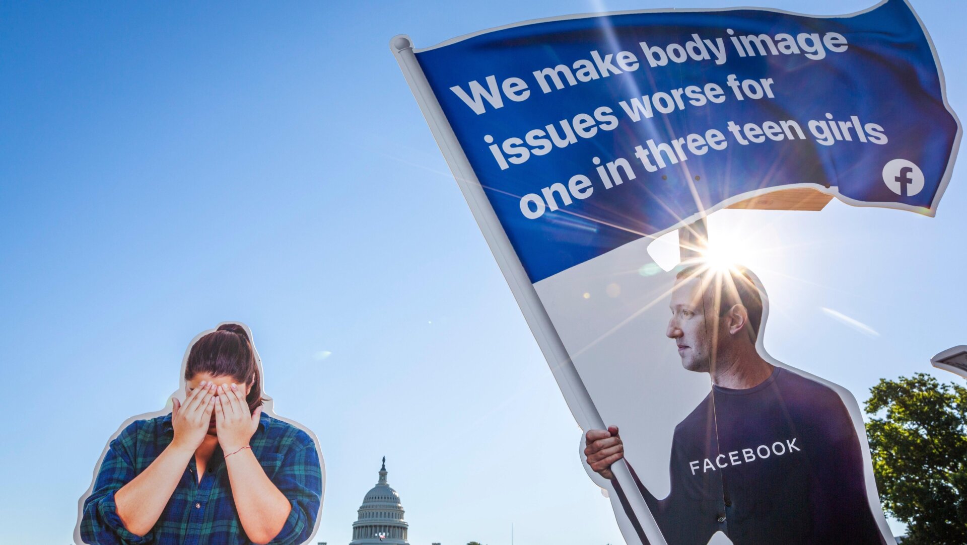 Nonprofit advocacy group SumOfUs erected a 7ft visual outside the US Capitol depicting Facebook CEO Mark Zuckerberg surfing on a wave of cash while young women around him appear to be suffering Thursday, Sept. 30, 2021, in Washington.