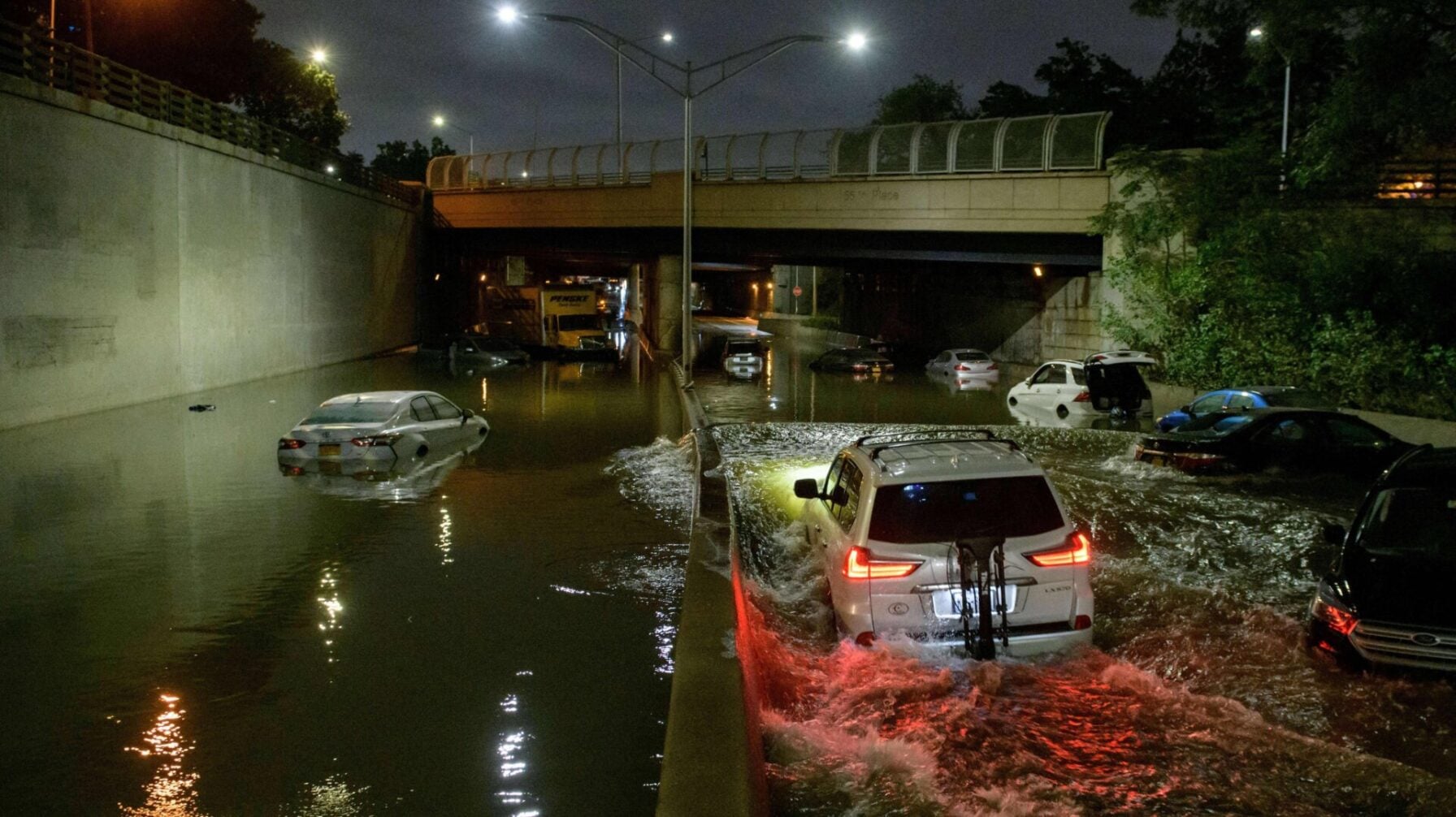 New York Grinds to a Halt as Record Rain Floods City, Kills At Least 9