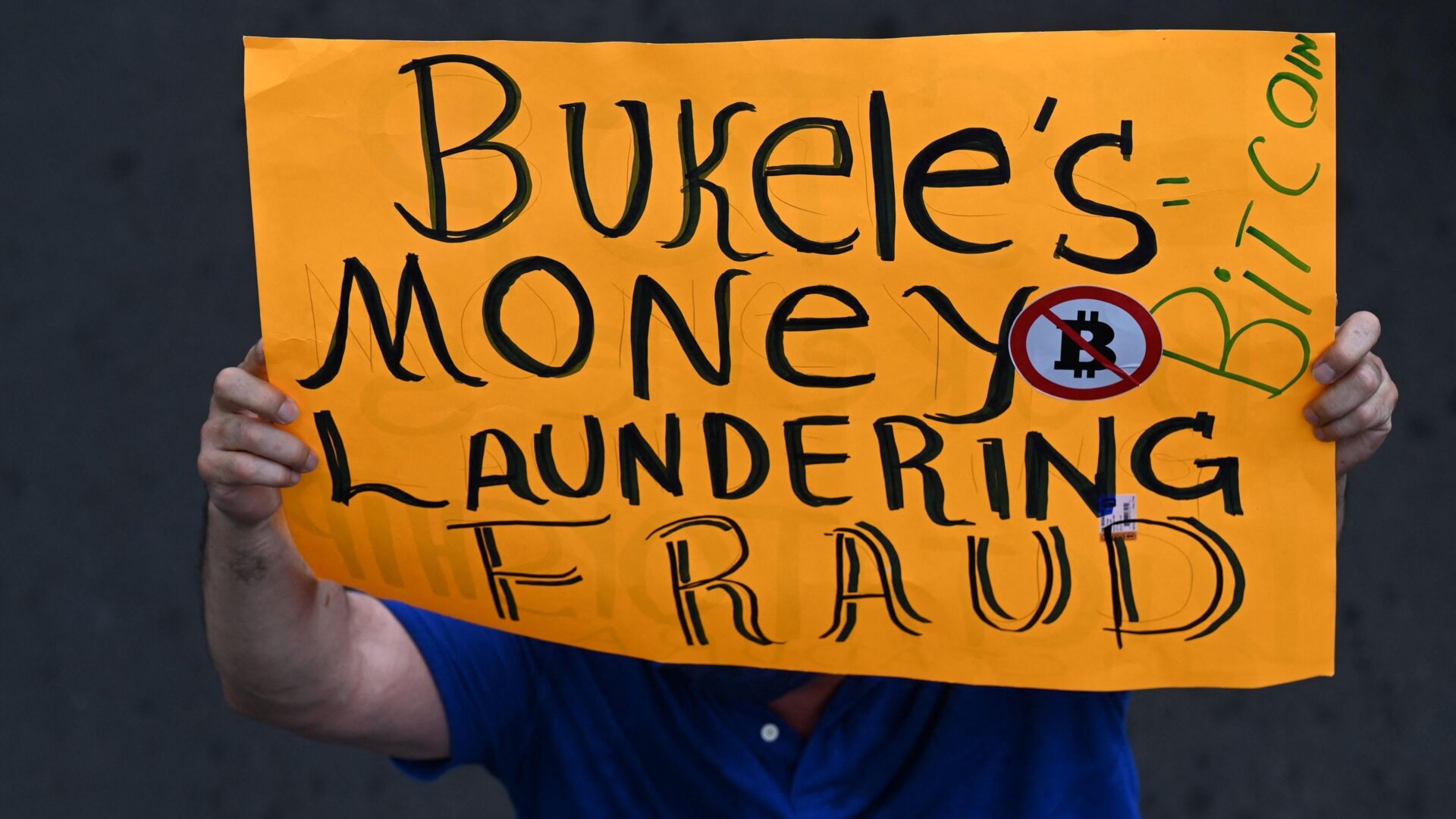 A man protests against the adoption of Bitcoin as legal tender in El Salvador on September 7, 2021.