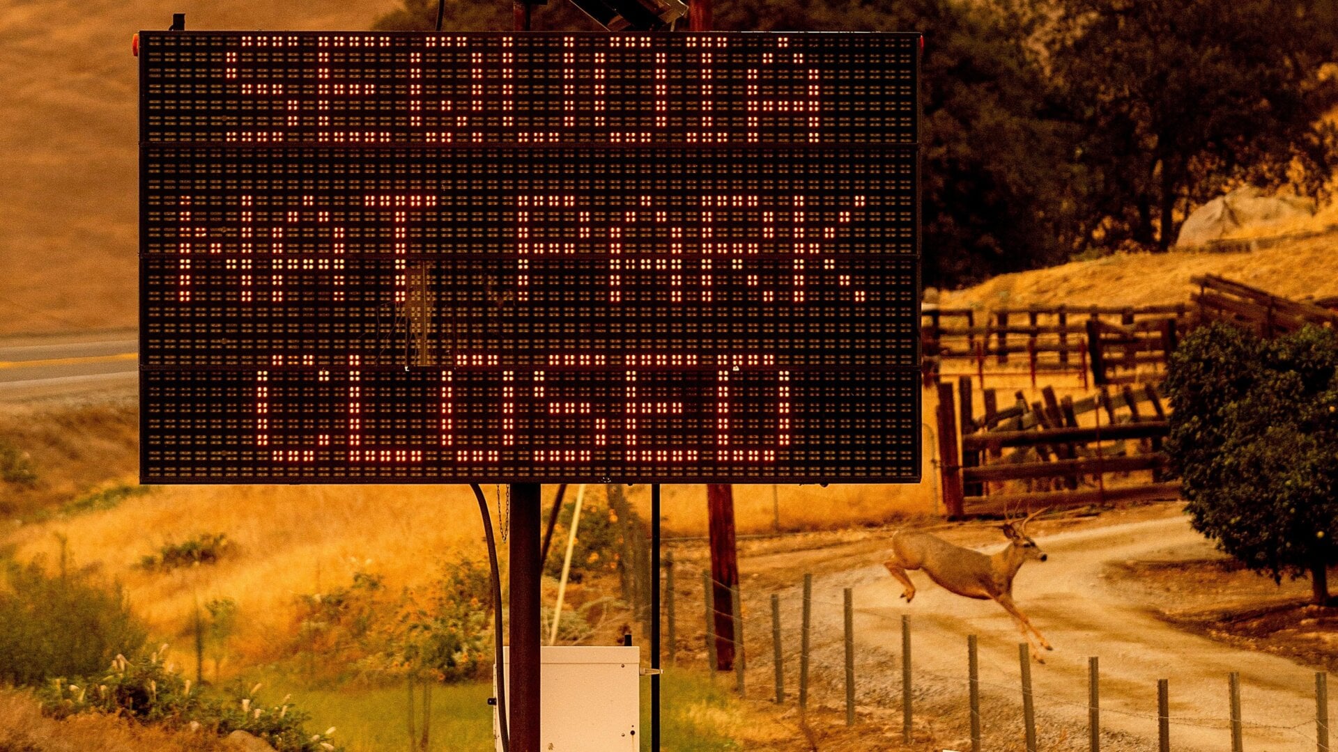 A sign announces the closure of Sequoia National Park, where the KNP Complex Fires are burning, Tuesday, Sept. 14, 2021, in Tulare County, Calif.