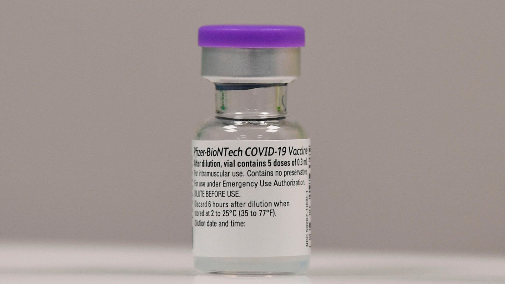 A vial of the Pfizer-BioNTech Covid-19 vaccine is seen at a vaccination health center in Cardiff, South Wales in the UK on December 8, 2020