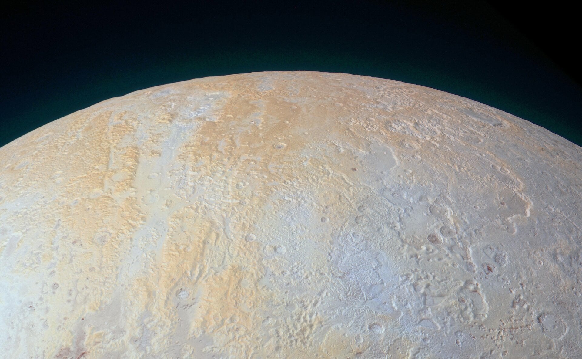 Pluto’s north pole, imaged in 2015, is covered in methane ice and pockmarks.
