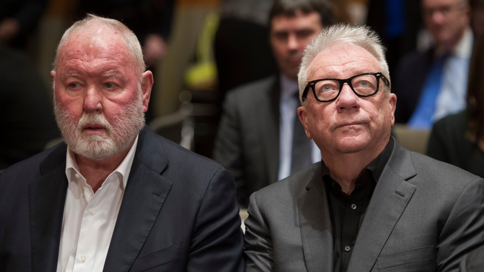 Photo: Former Backpage.com owners, James Larkin, left, and Michael Lacey wait on Capitol Hill in Washington, to appear at a congressional hearing on Jan. 10, 2017. (Cliff Owen)