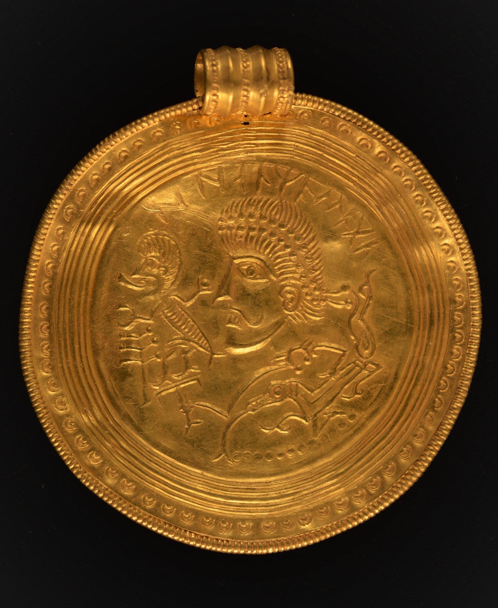 One of several medallions found at the site.